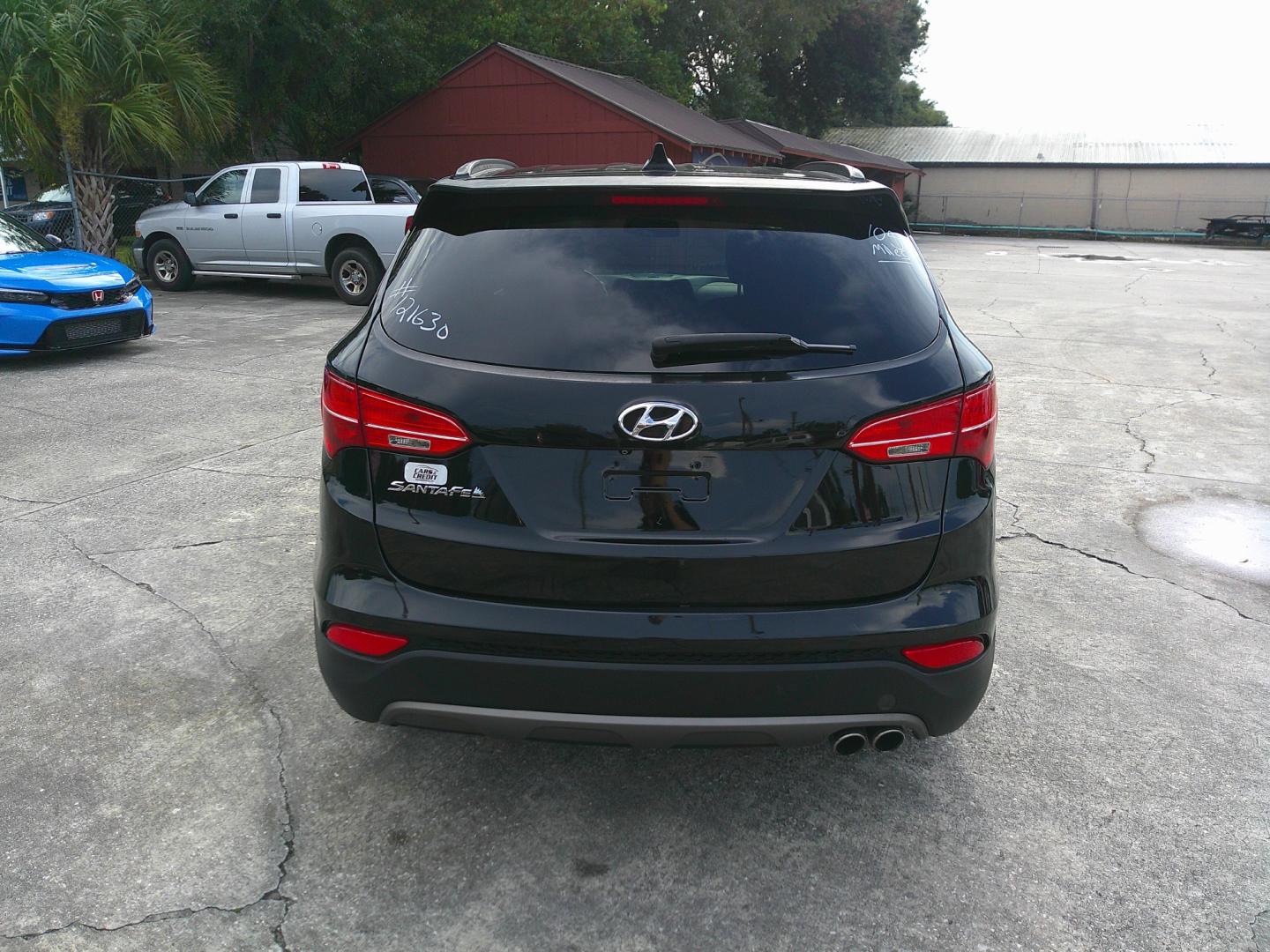 2014 BLACK HYUNDAI SANTA FE SPORT 2.0T (5XYZU3LA6EG) , located at 1200 Cassat Avenue, Jacksonville, FL, 32205, (904) 695-1885, 30.302404, -81.731033 - Photo#4